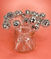 Close-up of bachelorette cocktail with glittery disco stirrer